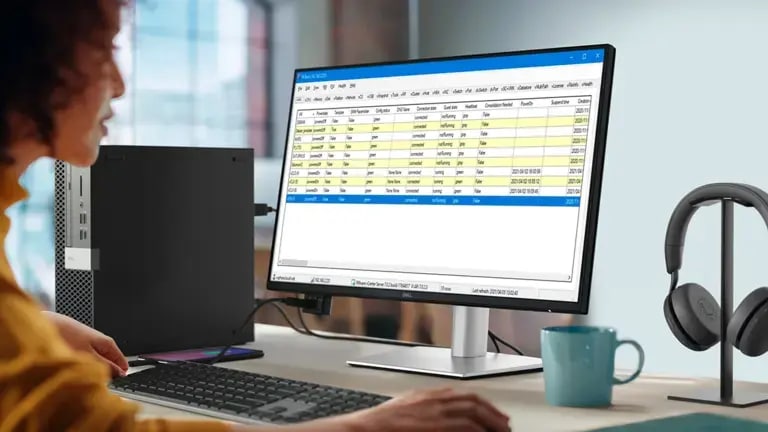 A female business professional working in the office without a headset